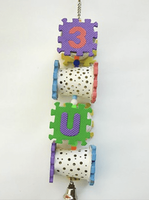 A colorful Cupow LG toy with the letters e and u hanging from it.